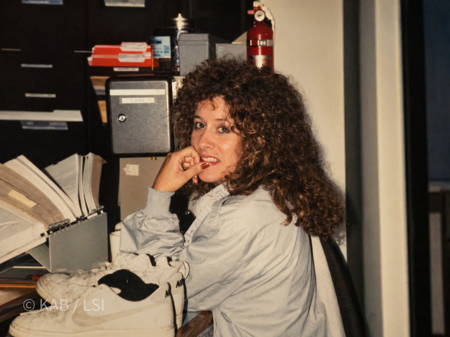 Sherri Bennett in 1986 at the back-office desk of Stewart Properties, the property-management division of Bankers Realty in Orange County, California.